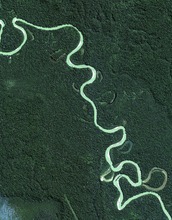 A false-color satellite image shows a western Amazonian river course